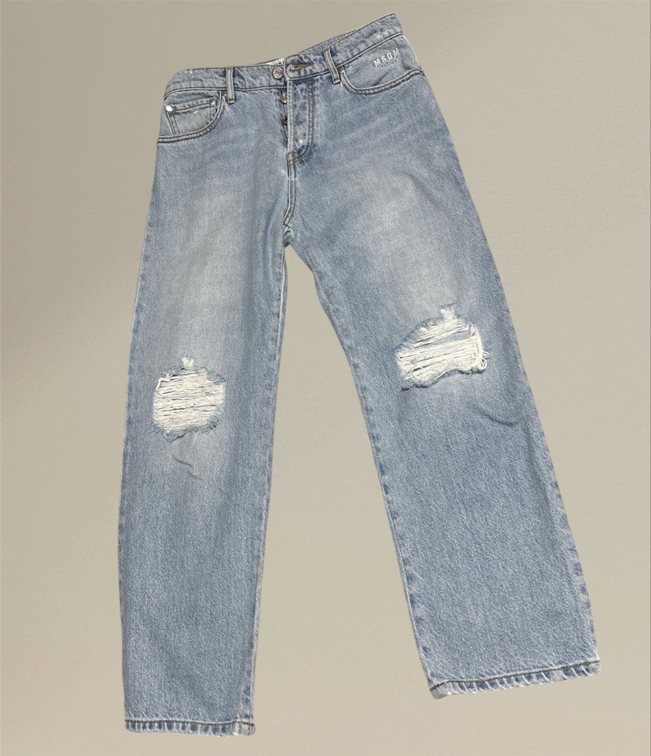 MSGM Denim Jeans (boyfriend jeans) (Category: Jeans) located in Pasig City. Submitted by burtonxxx (Listing ID 1436521889, Image 3). Description: - Light blue denim jeans - MSGM logo printed on the back - Straight leg fit - Distressed details on the front - Button fly closure - 30 waist - 38 hips - 37 length - 7 hem - rise 11.