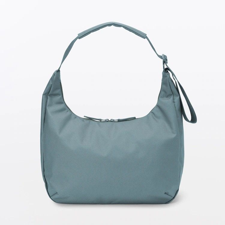 Muji 2 Way Water Repellent Bag (Category: Cross-body Bags) located in Quezon City. Submitted by chubbyshopper (Listing ID 1436594885, Image 2). Description: Brand New Hard to find color Shipping or Lalamove c/o buyer.