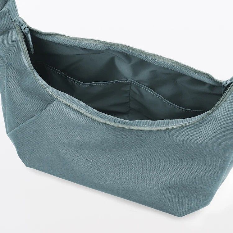 Muji 2 Way Water Repellent Bag (Category: Cross-body Bags) located in Quezon City. Submitted by chubbyshopper (Listing ID 1436594885, Image 3). Description: Brand New Hard to find color Shipping or Lalamove c/o buyer.