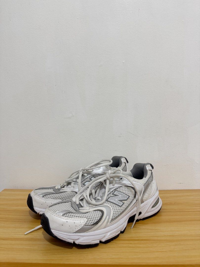 New Balance 550 (Category: Sneakers) located in Iloilo. Submitted by itsdanicanicole (Listing ID 1436528411, Image 2). Description: - New Balance 550 - Color: White and Silver - US Women's Size: 7.5 US | 24 cm - Mesh upper with synthetic overlays - Iconic 'N' logo on sides - Black and white soles - Made in Vietnam.