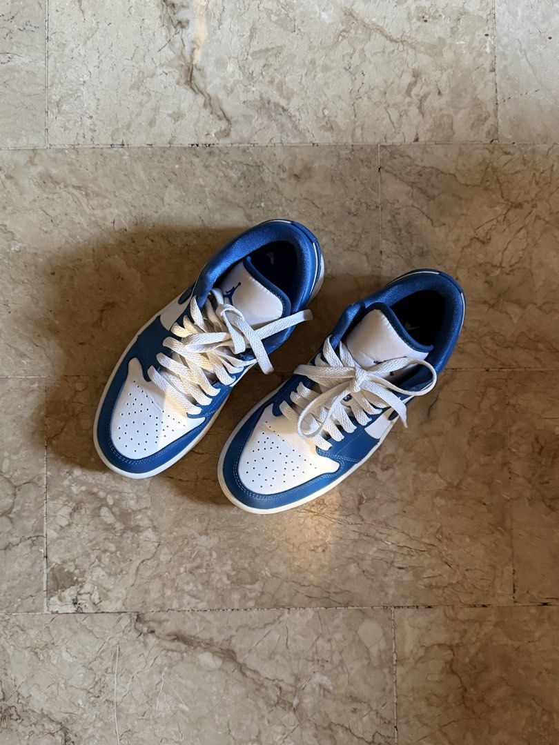 Nike Air Jordan 1 Low - White/Blue (Category: Sneakers) located in Pasig City. Submitted by declutterwithe (Listing ID 1436541937, Image 3). Description: - Air Jordan 1 Low - Color: White and Blue - Size: 6.5 (Women's) - Includes original box - Style code: DQ7774 114.