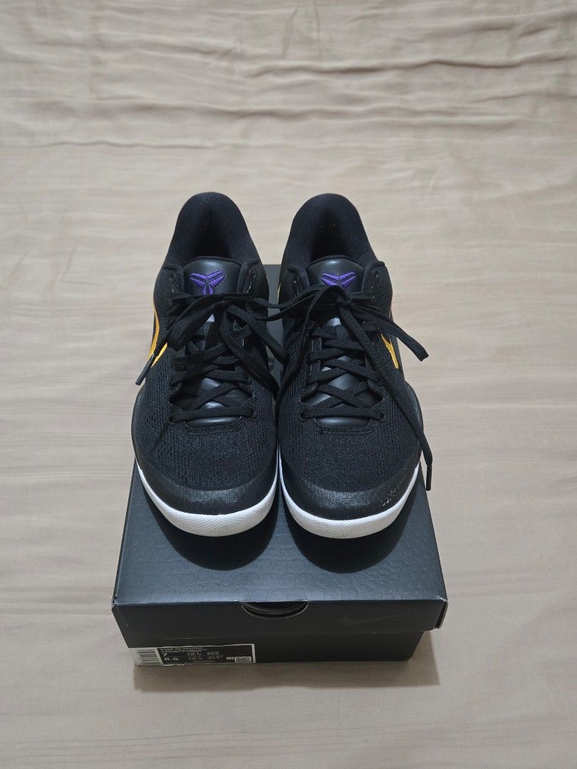 Nike Kobe 8 Protro Black/Yellow (Category: Sneakers) located in Manila. Submitted by nisalorraine (Listing ID 1436644493, Image 2). Description: - Nike Kobe 5 Protro sneakers - Color: Black with yellow accents - Sole: White - Details: Purple accents - Includes original box - Condition: Good - Laced up.