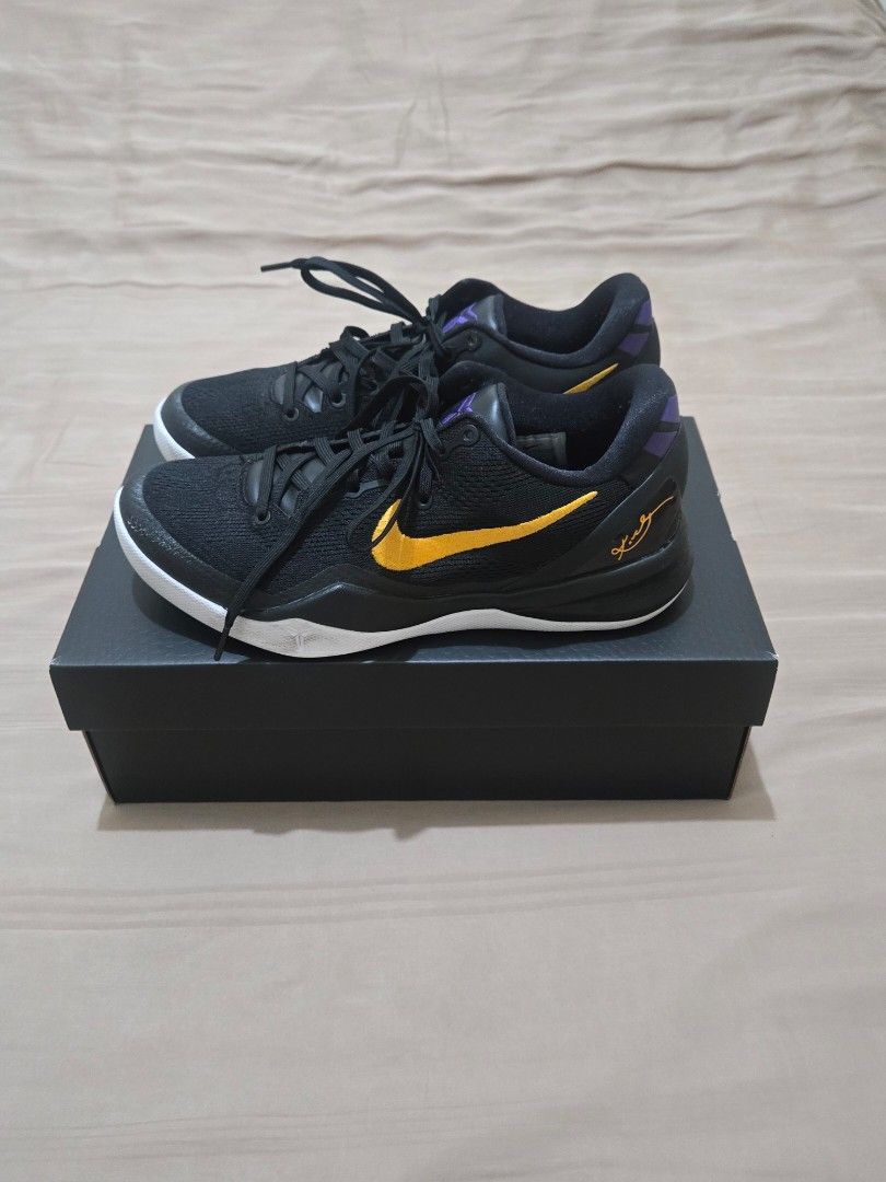 Nike Kobe 8 Protro Black/Yellow (Category: Sneakers) located in Manila. Submitted by nisalorraine (Listing ID 1436644493, Image 1). Description: - Nike Kobe 5 Protro sneakers - Color: Black with yellow accents - Sole: White - Details: Purple accents - Includes original box - Condition: Good - Laced up.