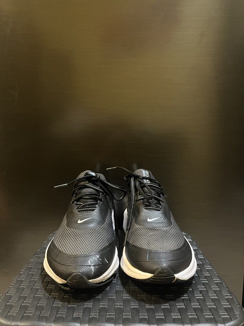 Nike Running Shoes Black and White (Category: Sneakers) located in Quezon City. Submitted by charles.mohamed (Listing ID 1436553950, Image 2). Description: - Black upper with white midsole - Nike swoosh visible - Black laces - Mesh-like upper material - Running-specific sole.