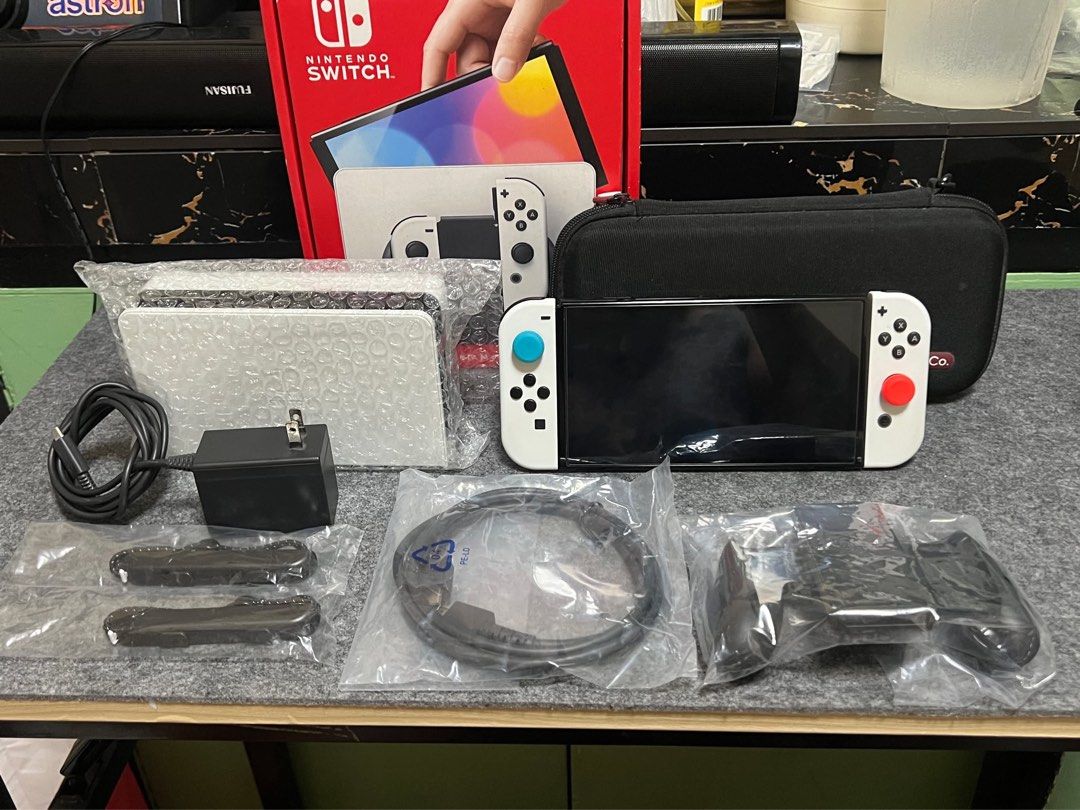NINTENDO SWITCH OLED (64GB) 128 SD (Category: Nintendo) located in Manila. Submitted by itsmemark26 (Listing ID 1436574537, Image 1). Description: NINTENDO SWITCH OLED 64GB 128SD COMPLETE BOX MANUAL CHARGER HDMI CABLE DOCK JOYCON JOYCON ADAPTER SKULL & CO POUCH + 1 game BAYONETTA 3 GOOD AS NEW 13500.