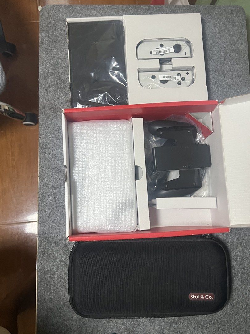 NINTENDO SWITCH OLED (64GB) 128 SD (Category: Nintendo) located in Manila. Submitted by itsmemark26 (Listing ID 1436574537, Image 2). Description: NINTENDO SWITCH OLED 64GB 128SD COMPLETE BOX MANUAL CHARGER HDMI CABLE DOCK JOYCON JOYCON ADAPTER SKULL & CO POUCH + 1 game BAYONETTA 3 GOOD AS NEW 13500.