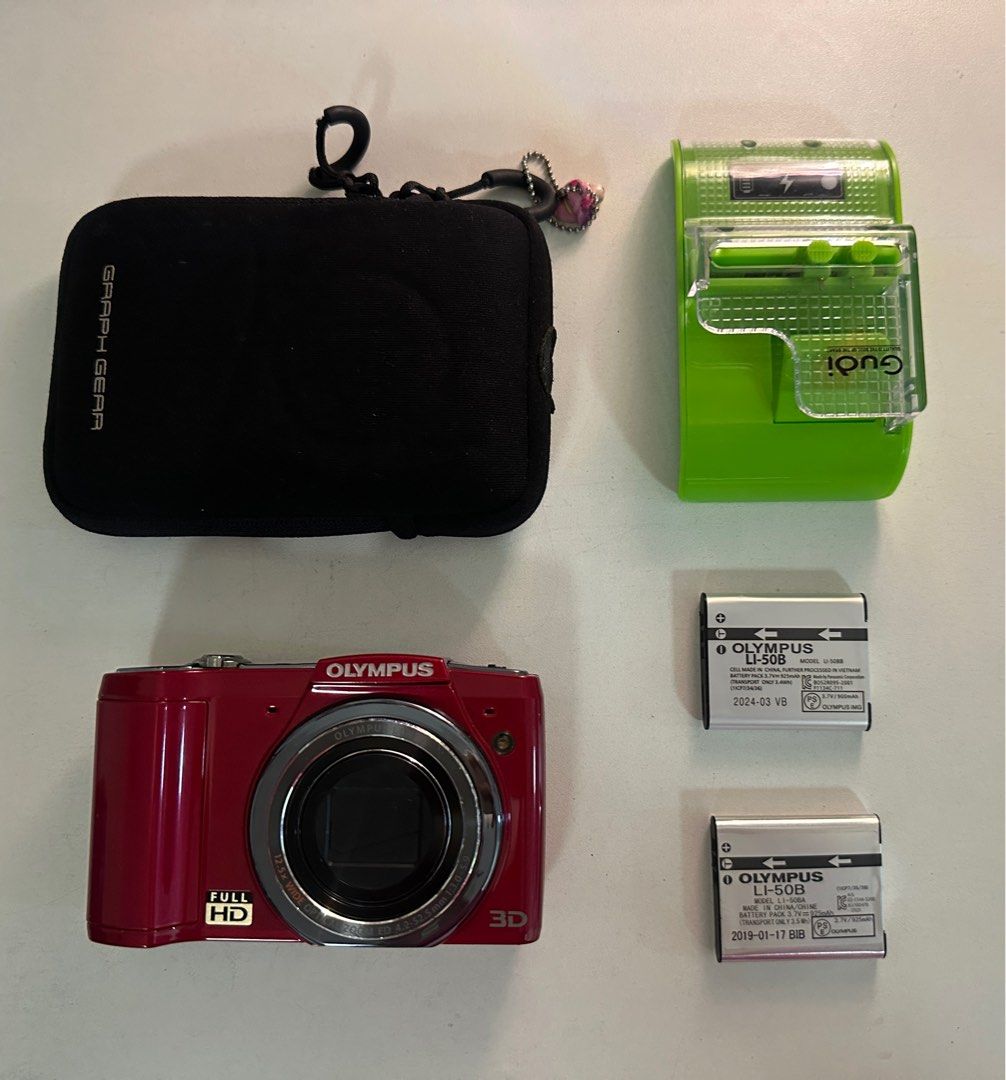 Olympus SZ-20 Digital Camera (Category: Cameras) located in Quezon City. Submitted by mailsbyme (Listing ID 1436618910, Image 1). Description: - Olympus SZ-20 digital camera (red) - all functions working - w/ pop-up flash - 12.5x super wide zoom - 16 megapixels - Full HD display BODY: 10/10 INCLUSIONS: - unit - camera case - two batteries - charger NO RETURN & REFUND POLICY! DO YOUR RESEARCH BEFORE BUYING. CAN DO SAME DAY DELIVERY FREEBIES: - sti