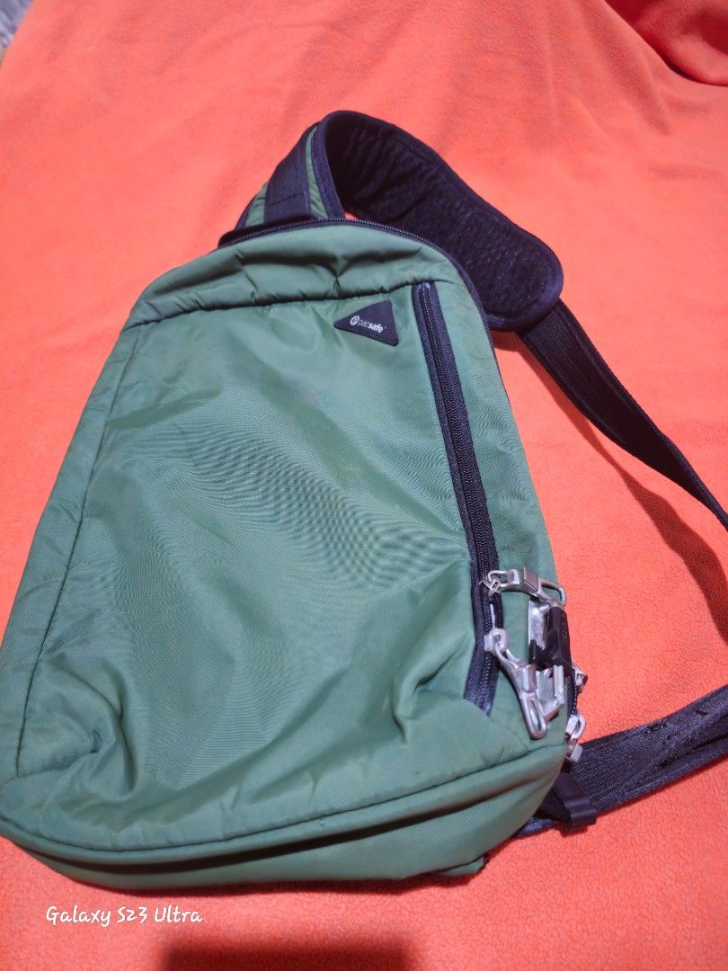 Pacsafe Vibe 325 Anti-Theft Sling Pack (Category: Sling Bags) located in Quezon City. Submitted by bagsforless16 (Listing ID 1436629164, Image 1). Description: 2 Zip Compartments with Multi Organizer Slots All Hardware Silver Color Front Top Logo No Discoloration Very Clean Interior Ready to Use Padded Back 10 Liter Capacity Lightweight Top Handle Size: 15" x 10" x 3".