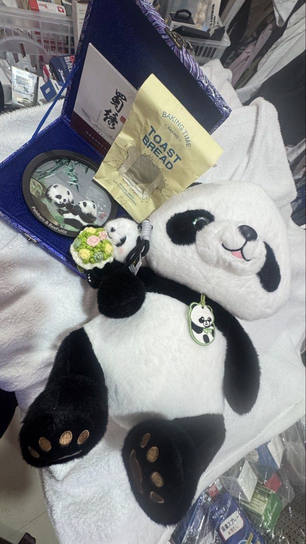 Panda collection (Category: Toys & Games) located in Rizal. Submitted by pickupagad (Listing ID 1436498325, Image 2). Description: Take all from amazon 1 big panda stuffed toys (Quality) 1 keychain 1 embroidered carved wood .