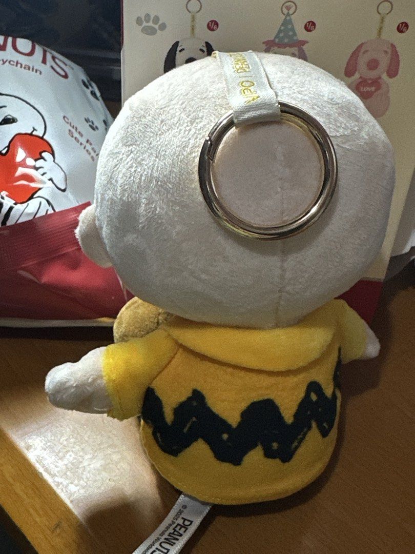Peanuts Charlie Brown Plush Keychain (Category: Toys & Games) located in Manila. Submitted by mellieb77 (Listing ID 1436514149, Image 2). Description: - [ ] Peanuts Plush Pendant Charlie Brown ❗️Quitting sale! 🌸With box, foil, and card Can give discount if you’ll be buying it with at least 2 from my quitting sale products which you can find in my profile! 🥰 Meetup: BGC, Glo, GB MOD: Lalamove MOP: Cash/Gcash .