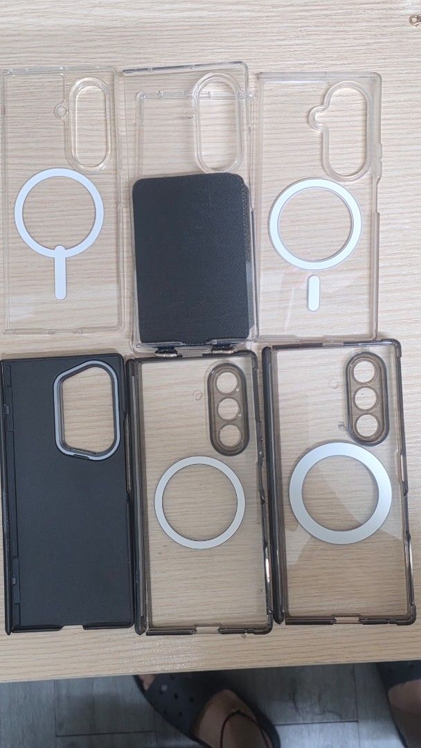 Galaxy Fold 7 Cases (Category: Cases & Sleeves) located in Taguig. Submitted by janeydoe1 (Listing ID 1436575884, Image 2). Description: Samsung Galaxy Fold 7 Phone cases for sale! TAKE ALL 6 FOR 1200 ONLY! - Clear cases with white ring holders - Black cases with ring holders - Cases with camera lens protection - Some cases include a built-in ring holder. .