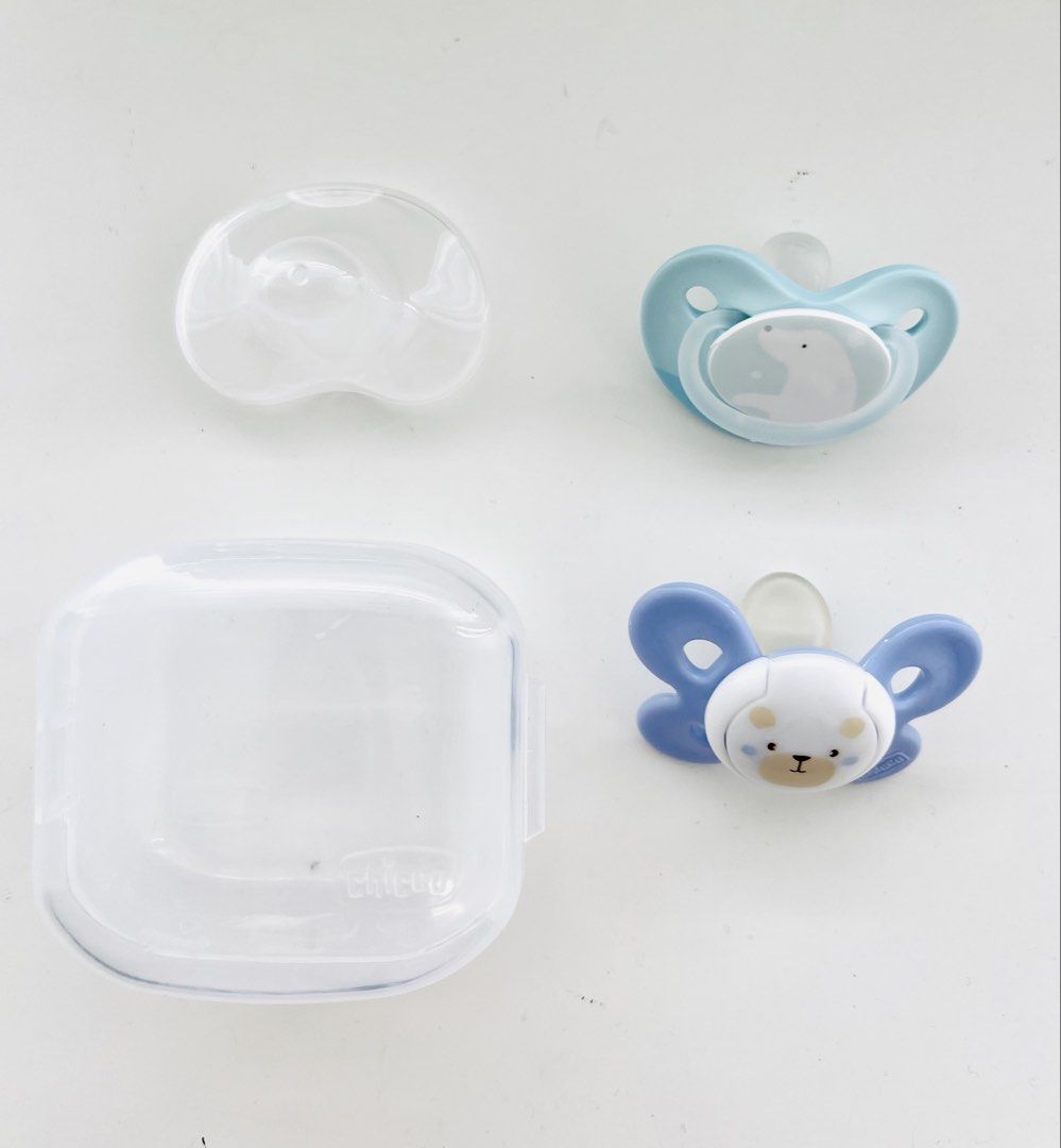 Pigeon and Chicco Pacifier (Category: Soothers & Pacifiers) located in Quezon City. Submitted by vinzvcc (Listing ID 1436536310, Image 1). Description: Includes 2 pacifiers: - for 0-6 months babies - bought in Baby Co. - used once as trial only - RFS: Baby doesn’t like pacifier - SF to be shouldered by Buyer PIGEON - Light blue with seal animal - comes with protective covering - nipple same with pigeon bottles CHICCO - Darker Blue with Bear - com