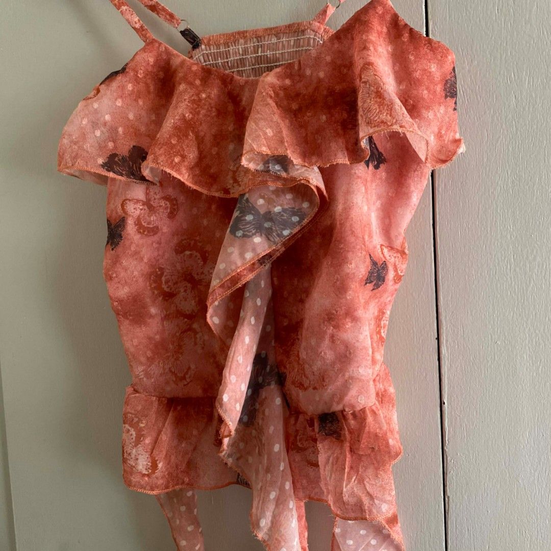 Pink Peach Butterfly Print Ruffle String Sleeveless Top (Category: Sleeveless) located in Manila. Submitted by cznclae (Listing ID 1436520267, Image 3). Description: best fit for size XS-S Bust: up to 32" ❔issue: sf mm & luzon 41 pesos if not rush via jnt 🗓️ check bio for next shipment sched PLEASE READ! ❗️PAYMENT FIRST via g/cash or Pabili service 🛒how to buy? make an offer, then send details for SF quotation feel free to ask q's. bump your me