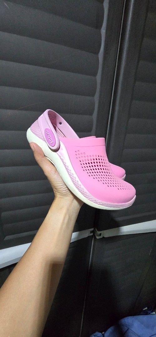 Pink Sandals (Category: Flats & Sandals) located in Manila. Submitted by muliph (Listing ID 1436477599, Image 2). Description: - Size J1 - Pink sandals - Perforated design for breathability - Secure fit with back strap - White sole - Lightweight material - Perfect for casual wear - Soles show some wear - Flaw: minimal pen mark on left pair.
