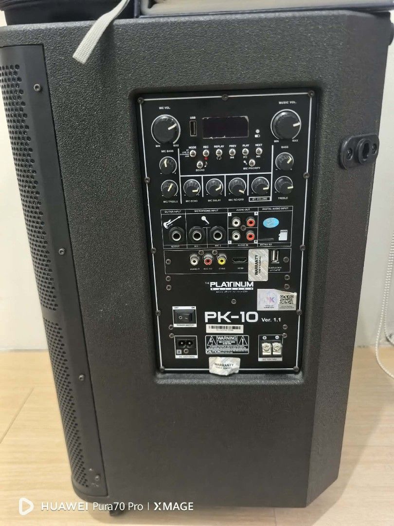 Platinum PK-10 Karaoke Speaker System (Category: Soundbars, Speakers & Amplifiers) located in Manila. Submitted by juliana01.07 (Listing ID 1436562050, Image 2). Description: - Platinum PK-10 Karaoke Speaker System - Includes: - Speaker - 2 Wireless Microphones - Songbook - Remote Control - Cables - Features: - Multiple Input Options - Control Knobs - Black Color - Wheels for Easy Transport - Platinum Brand Logo Honest issue: Dapat naka plug kasi