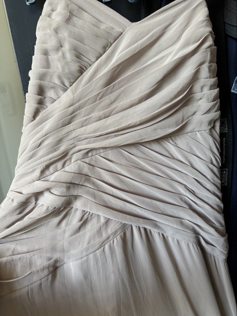 Pleated Strapless Nude Beige Long Gown (Category: Evening dresses & gowns) located in Tarlac. Submitted by berrymii (Listing ID 1436508246, Image 1). Description: - Strapless dress in a light brown color - Features a pleated bodice - Flowing skirt design - Button closure at the back - Perfect for special occasions -Customized, bought for 5k -Used once for a wedding -Not padded -Needs dry clean -Issue: May tastas sa ilalim but di naman halata 📍Lo