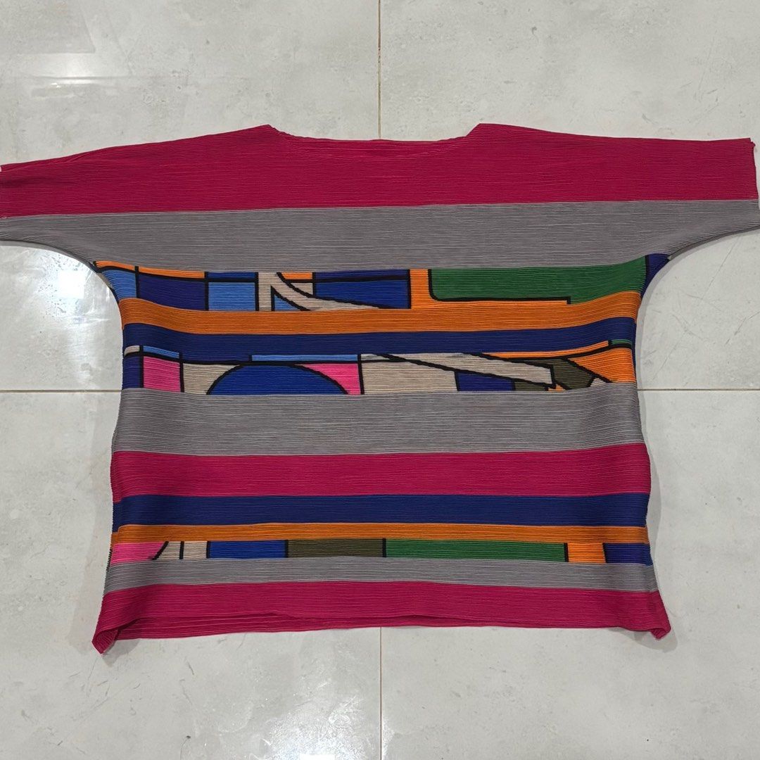 Pleats please issey miyake shirt (Category: Luxury Apparel) located in Cebu City. Submitted by florianmiral (Listing ID 1436609130, Image 1). Description: Pleats please issey miyake shirt Excellent condition Free size, cut tag W 21 L 20.5.