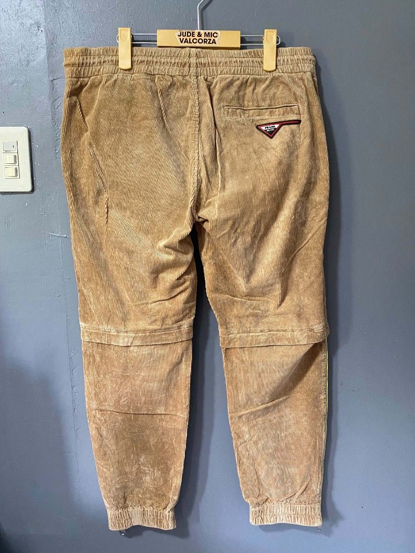 Prada Corduroy Jogger Pants 3XL (Category: Joggers) located in Tanay. Submitted by micvalcorza (Listing ID 1436489612, Image 2). Description: - Prada corduroy jogger pants - Color: Tan - Size: 3XL (fits W-34-38, L-37) - Features: - Drawstring waist - Relaxed fit - Ankle zippers - Back pocket with Prada logo - 900 plus Ship.