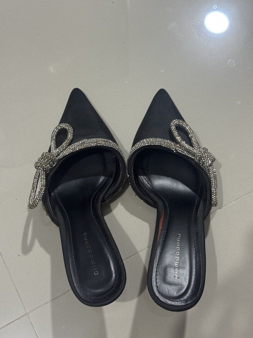 Primadonna Black Heels with Bow Detail (Category: Heels) located in General Trias. Submitted by rhea_castillo.744 (Listing ID 1436645800, Image 3). Description: - Black stiletto pumps - Size 37 - Used twice only Issue: Some missing rhinestones Location: General Trias, Cavite.