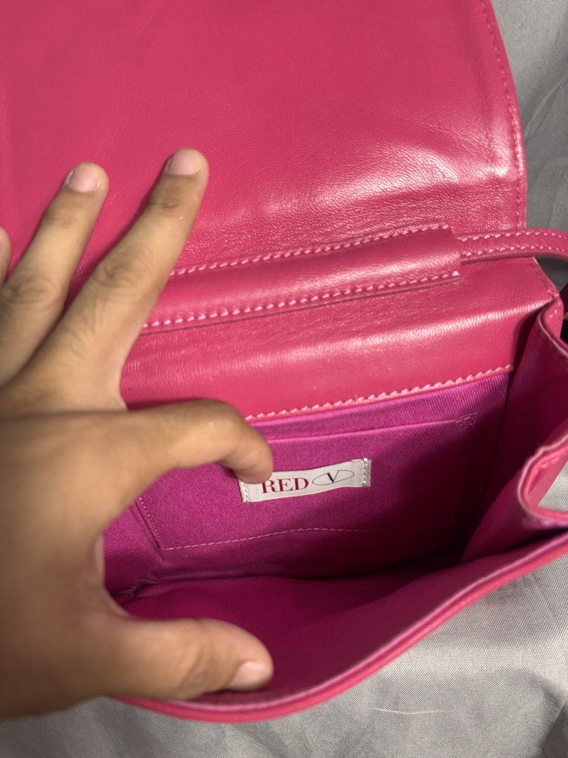 Red Valentino Pink Sling Bag (Category: Luxury Bags & Wallets) located in Manila. Submitted by earlylifecrisis3 (Listing ID 1436588577, Image 3). Description: Condition 9/10 Measure it by inch Width: 7 Length: 6.5 Depth: 0.5 Handle: 19 •Refund / Returns not allowed allowed •Please do check the dimensions size on labels sometimes are not accurate on the sizing •Ask me before purchasing.