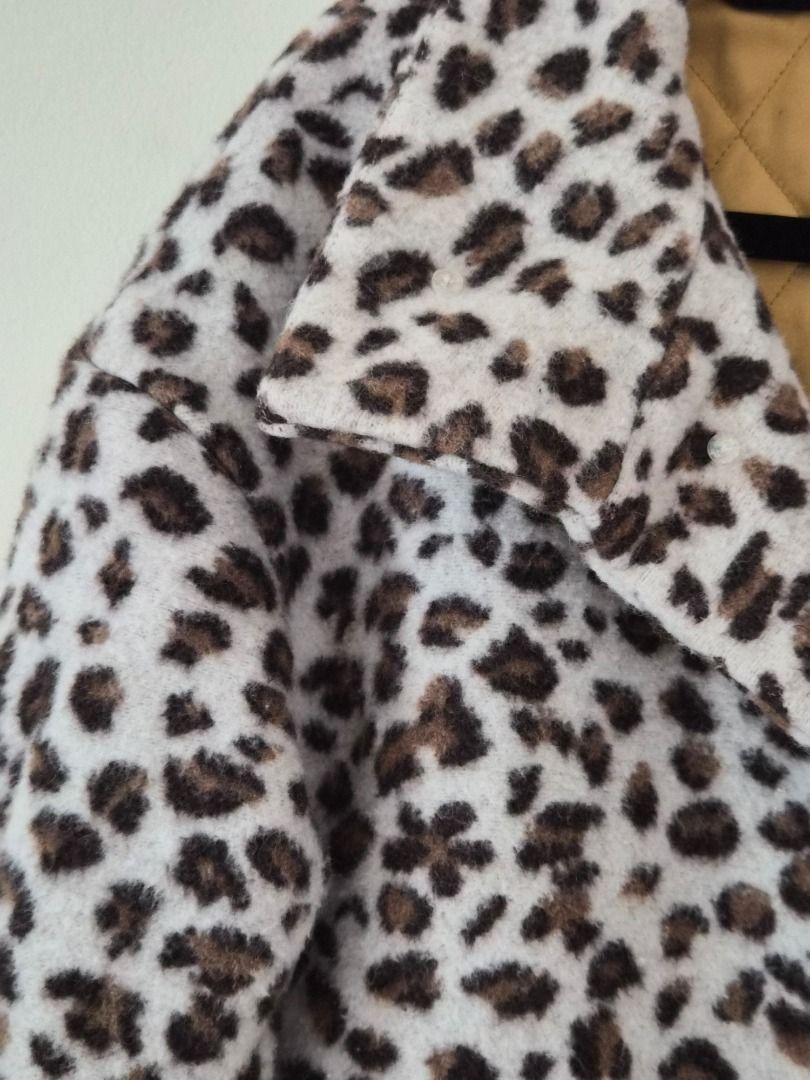 Rodeo Crowns Leopard Print Coat (Category: Coats, Jackets and Outerwear) located in Makati City. Submitted by shaundeshop (Listing ID 1436573138, Image 2). Description: - Leopard print coat - Classic collar - Button-down closure - Two front pockets - Quilted lining - Authentic brand.