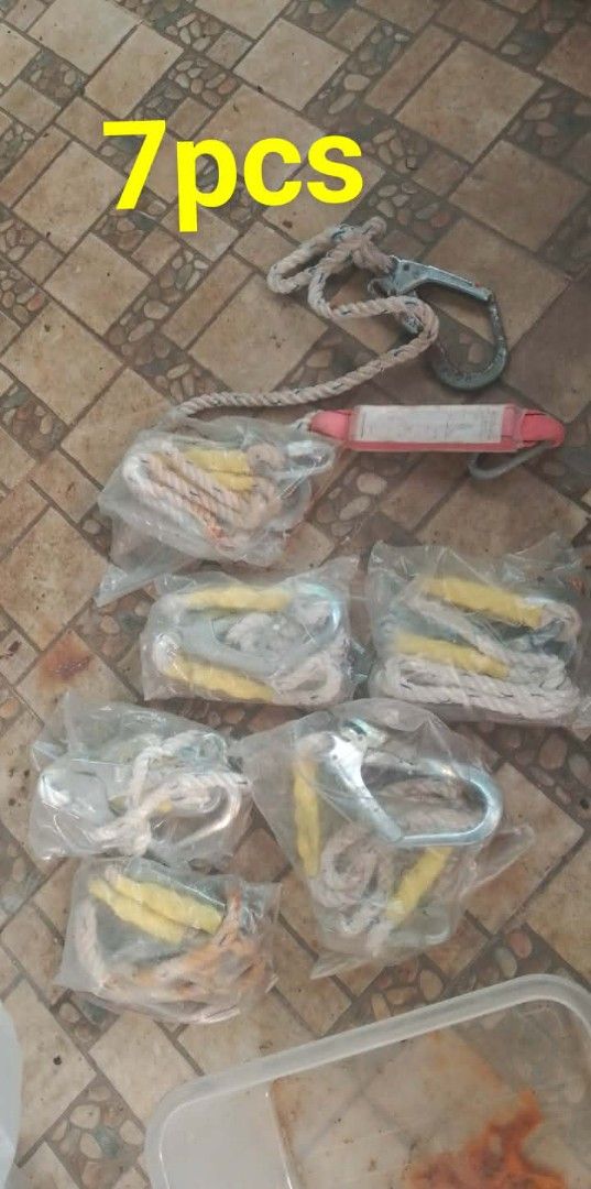 Safety Harness Set (7 pieces) (Category: Construction Tools & Equipment) located in Quezon City. Submitted by jacxav (Listing ID 1436495337, Image 1). Description: - 7-piece safety harness set - Each harness includes a rope and hook - Packaged in clear plastic - Includes a longer rope with a hook and a red safety component - Perfect for construction and fall protection.