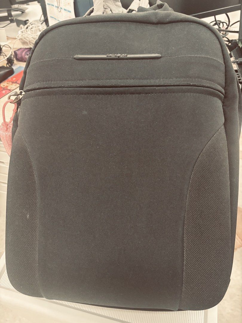 Samsonite Black Laptop Bag (Category: Backpacks) located in Mandaluyong City. Submitted by byolivia_finejewelry (Listing ID 1436507602, Image 1). Description: - Black Samsonite backpack - Main compartment and front zippered pocket, with laptop compartment and several compartments perfect for documents. - Shoulder strap with wear and tear - Made of durable fabric - Perfect for everyday use.