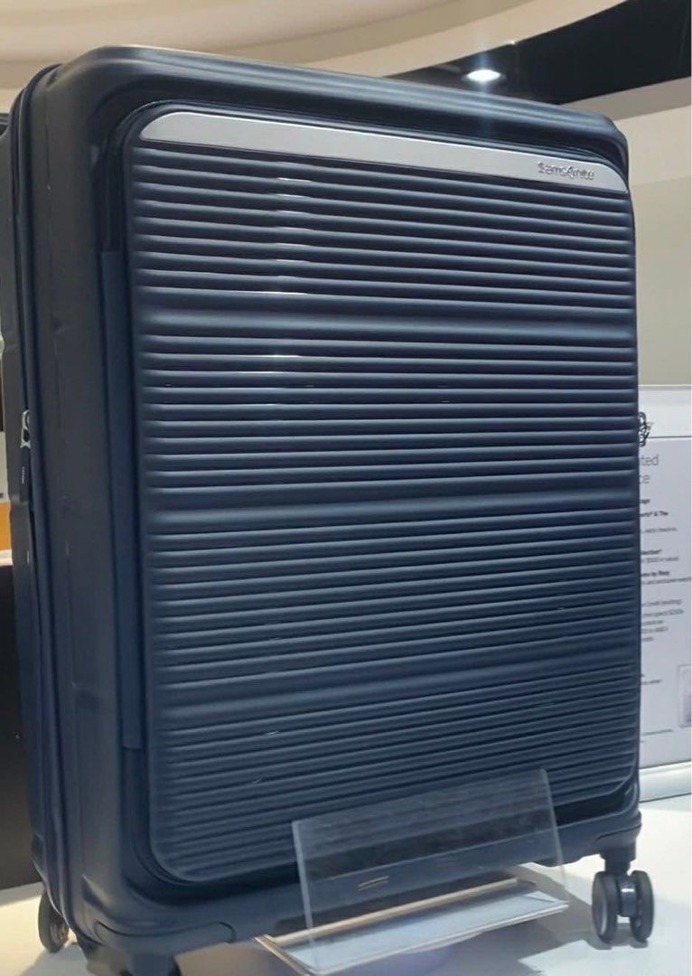 Samsonite Parallax HS Spinner 67/24 EXP Medium SP (Category: Luggage) located in Manila. Submitted by badong231981 (Listing ID 1436582943, Image 3). Description: Never used. Got it from raffle. I dont travel - Samsonite Parallax HS Spinner 67/24 EXP - Navy blue exterior - Ribbed design - Four wheels for easy movement - Pull handle - Secure closure - Medium size, suitable for various travel needs.