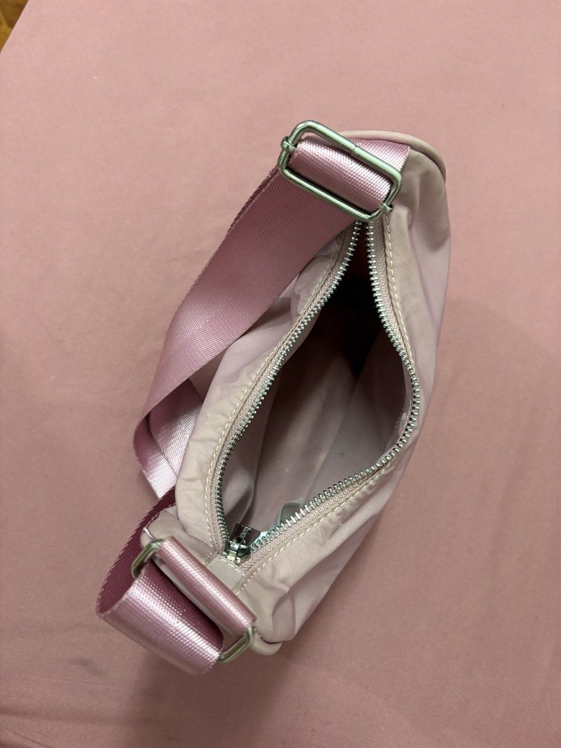 Shoulder Bag in Dusty Pink (Category: Shoulder Bags) located in Manila. Submitted by closetsofaddie (Listing ID 1436581424, Image 2). Description: - Dusty pink shoulder bag - Minimalist design - Single compartment with zipper closure - Adjustable strap included - Clean interior - Perfect for everyday essentials 💳Mode of Payment: 💙 GCash 🧡 MariBank 🩵 GoTyme 💸 Cash if Meetup! 🚚Mode of Delivery: JnT Delivery Lalamove if nearby/Same day May do 