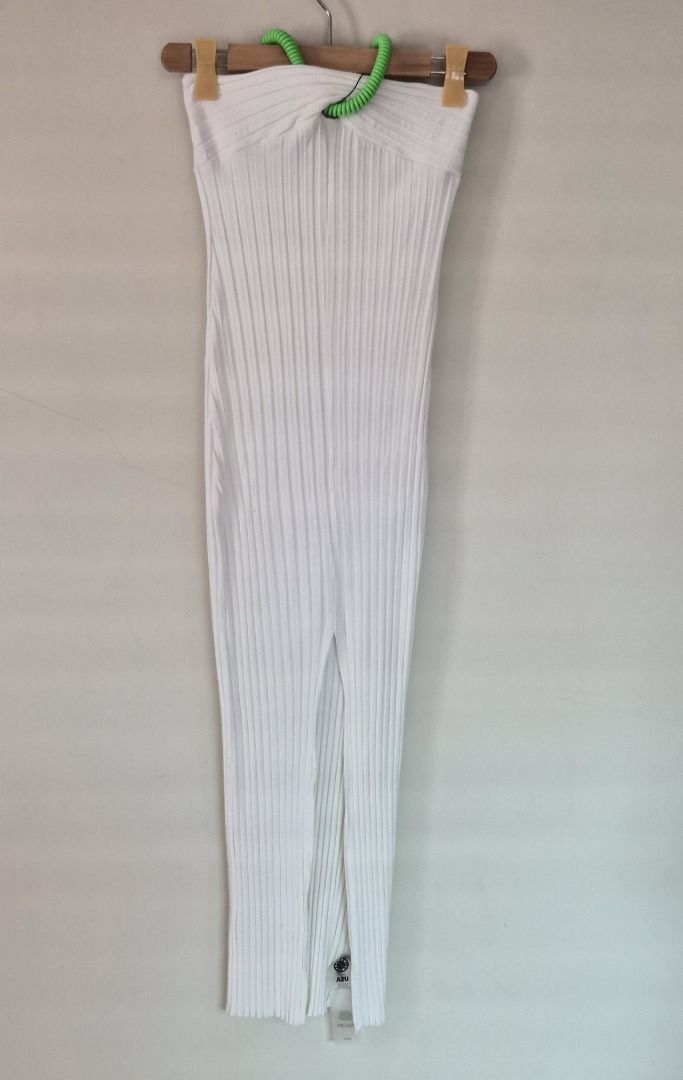 Simon Miller White Ribbed Dress with Slit (Category: Dresses) located in Makati City. Submitted by shaundeshop (Listing ID 1436564814, Image 1). Description: - Never used - Elegant white ribbed dress - Unique twisted neckline - High slit on the side - Bodycon fit - Comfortable, stretchy fabric - Ideal for special occasions - Fits XS/S.