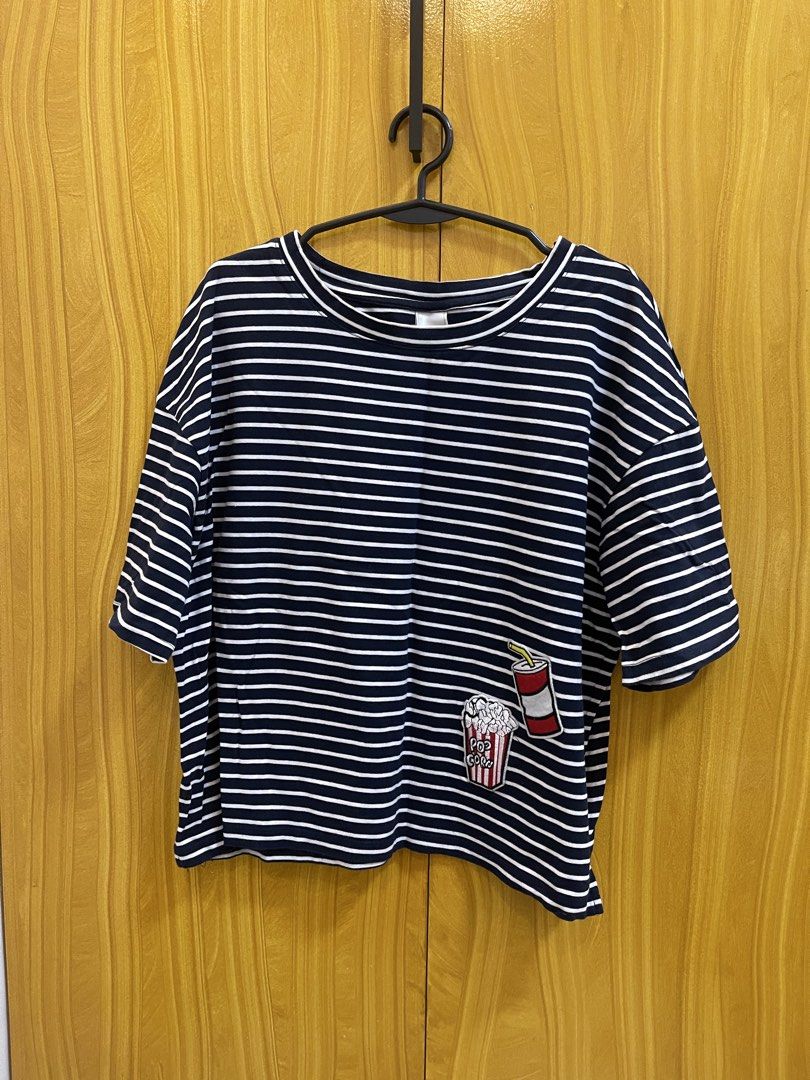 Striped Oversized T-shirt with Patches (Category: Shirts) located in Mandaluyong City. Submitted by jgpreluvs (Listing ID 1436632515, Image 1). Description: - Navy and white striped t-shirt - Features a fun popcorn and soda patch - Round neck - Thick fabric Fits SMALL TO LARGE frames (For smaller frames: oversized fit) MOP: Gcash/Maya/BDO Pay ❣️ Feel free to message me for more deets!.