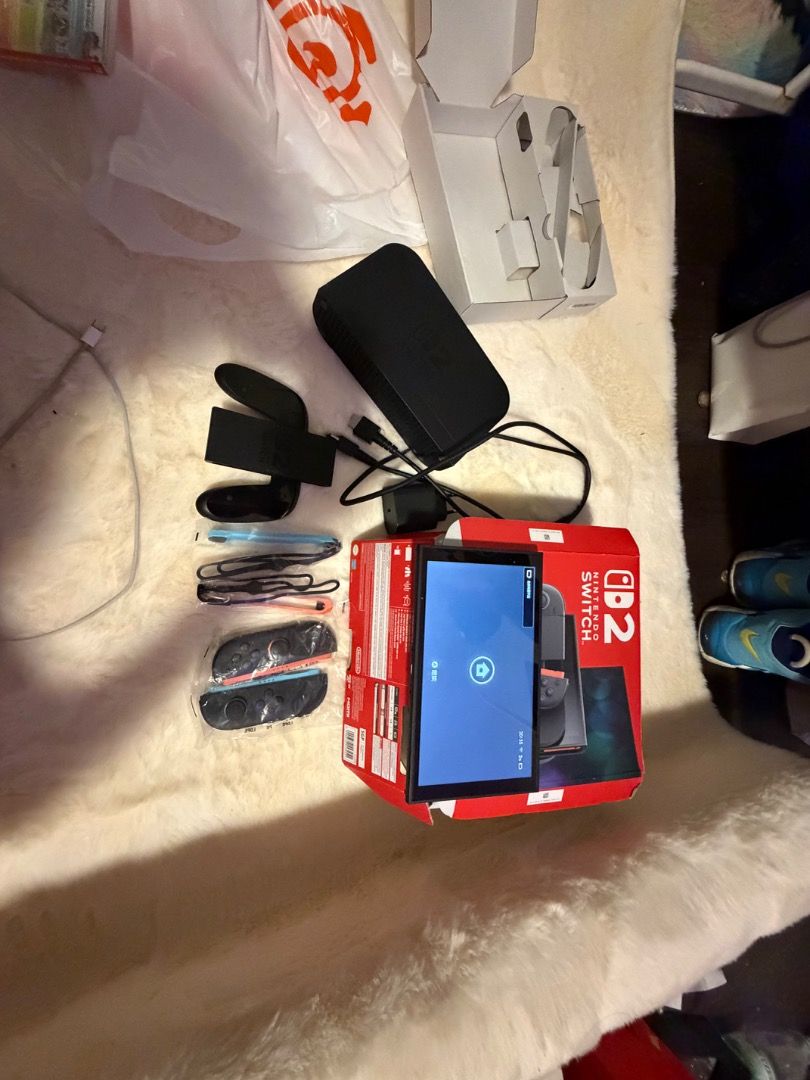 switch2 (Category: Nintendo) located in Singapore. Submitted by bravestorm_c54b75 (Listing ID 1436594263, Image 3). Description: Almost brand new. Full box and accessories included. Original charger, dock, HDMI cable, Joy-Cons and straps included. Comes with games. No scratches, no drift, well maintained.