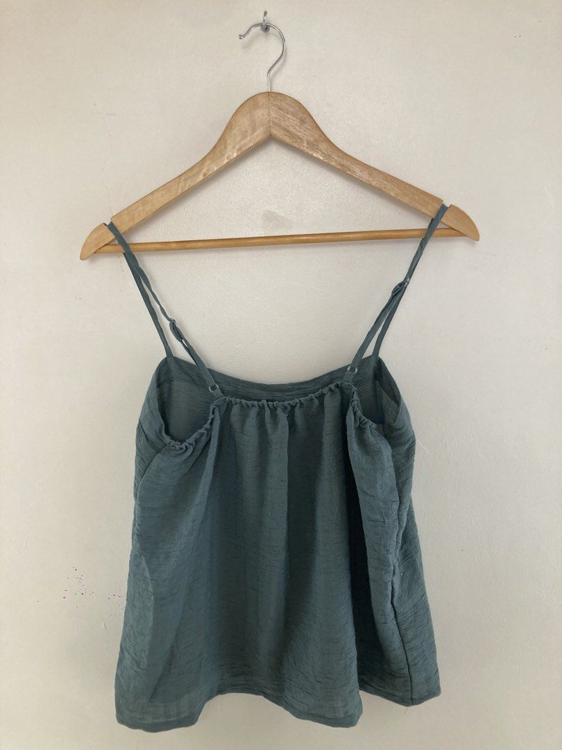 Teal Cami Top (Category: Sleeveless) located in Makati City. Submitted by jessicainstyle (Listing ID 1436502269, Image 2). Description: - Teal cami top - Adjustable spaghetti straps - Gathered neckline - Textured fabric - Relaxed fit - Solid color - Great for casual outfits.