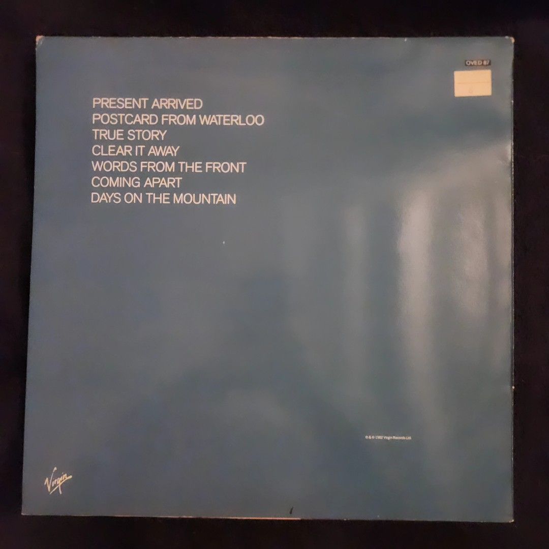 Tom Verlaine - Words From The Front Vinyl Record (Category: Vinyls) located in Caloocan City. Submitted by Secondhand_Sureshots (Listing ID 1436626693, Image 2). Description: - Tom Verlaine's "Words From The Front" vinyl record - Features tracks: "Words From The Front", "Coming Apart", "Days On The Mountain" - 33 1/3 RPM stereo - Produced by Tom Verlaine - Released by Virgin Records in 1982 - Includes original album cover and record sleeve.