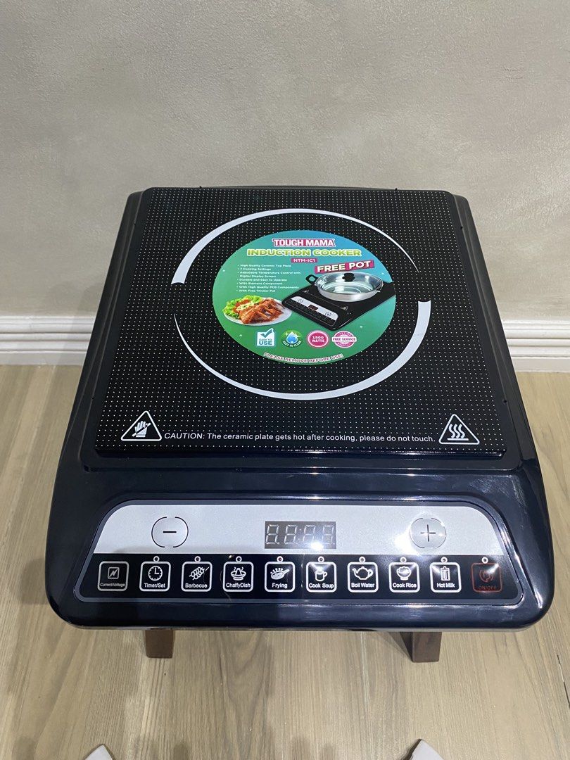 Tough Mama Induction Cooker NTM-IC1 (Category: Cookers) located in Manila. Submitted by papupeeps (Listing ID 1436617532, Image 3). Description: - Tough Mama Induction Cooker - Energy-saving features - High-quality ceramic top plate - 7 cooking settings - Adjustable temperature control with digital display - Includes a free pot - Durable and easy to operate - Siemens components and high-quality PCB components - Lifetime free service warranty.