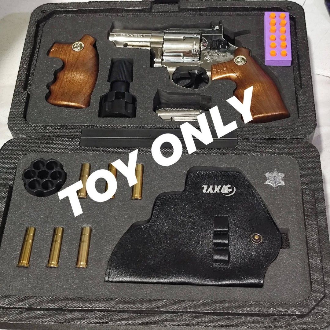 Toy Revolver Set (Category: Action & Battle Toys) located in Pasig City. Submitted by 1stop-shop (Listing ID 1436633357, Image 1). Description: ❗TOY ONLY❗ TOY ONLY ❗TOY ONLY❗ ✅BRAND NEW💚 Xiao Yue Liang XYL ZP-5 357 Golden Edition Snub-Nosed Gel Blaster Revolver – Collector’s Presentation Set ✅XYL ZP5 Revolver Toy Gun Features: Firing Mode: Manual Shooting Range: 15-25 Feet Material: Metal+ Solid Nylon Construction Thick Solid Body Bullet: Soft b