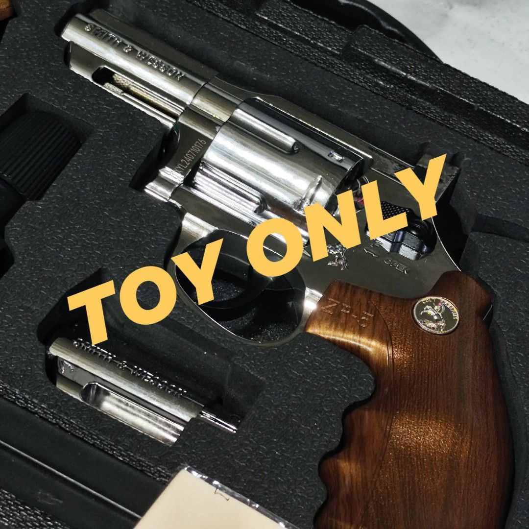 Toy Revolver Set (Category: Action & Battle Toys) located in Pasig City. Submitted by 1stop-shop (Listing ID 1436633357, Image 2). Description: ❗TOY ONLY❗ TOY ONLY ❗TOY ONLY❗ ✅BRAND NEW💚 Xiao Yue Liang XYL ZP-5 357 Golden Edition Snub-Nosed Gel Blaster Revolver – Collector’s Presentation Set ✅XYL ZP5 Revolver Toy Gun Features: Firing Mode: Manual Shooting Range: 15-25 Feet Material: Metal+ Solid Nylon Construction Thick Solid Body Bullet: Soft b