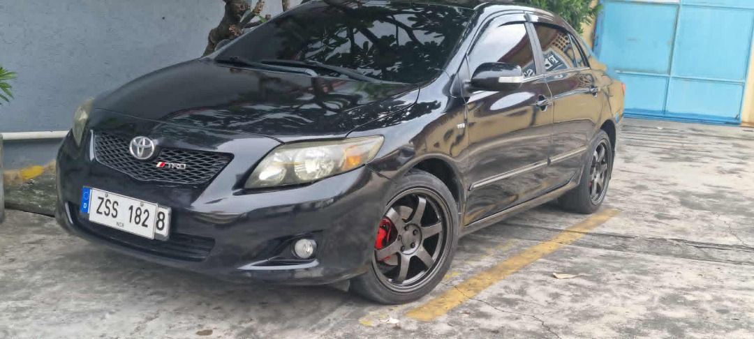 Toyota Corolla Altis 1.6 (A) (Category: Used Cars) located in Pasig City. Submitted by calmdragon (Listing ID 1436492227, Image 3). Description: Toyota Corolla Altis 1.6G 2009 Owner/Seller Midnight Black Shiny Paint Leather Dashboard Leather steering wheel Leather shift knob Reverse Cam Very Good Running condition Very Cold A/C All Lights working Newly reface disk/drum breaks New breakpads orig Toyota New 17s Rota Grid2 mags New Tires 225 50 r17 