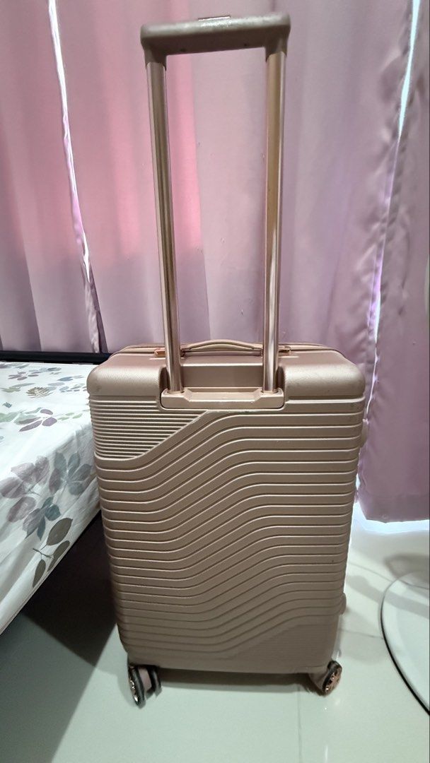Travelex Hard Case Luggage Medium ~ Rose Gold (Category: Luggage) located in Makati City. Submitted by svnshinemarie (Listing ID 1436596297, Image 3). Description: 🌸 used 2x only, very clean interior 🌸few scratches only 🌸size: Medium 🌸dimensions: 17.25" L x 10.5" W x 24" H 🌸ideal use: Checked baggage (20-22kg) 🌸with expandable zipper rfs: no longer needed.
