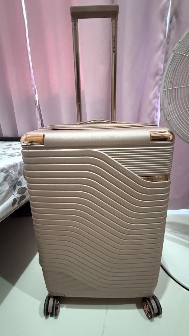 Travelex Hard Case Luggage Medium ~ Rose Gold (Category: Luggage) located in Makati City. Submitted by svnshinemarie (Listing ID 1436596297, Image 1). Description: 🌸 used 2x only, very clean interior 🌸few scratches only 🌸size: Medium 🌸dimensions: 17.25" L x 10.5" W x 24" H 🌸ideal use: Checked baggage (20-22kg) 🌸with expandable zipper rfs: no longer needed.