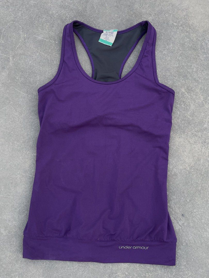 Under Armour Purple Tank Top (Category: Sleeveless) located in Makati City. Submitted by kayecheng (Listing ID 1436538908, Image 1). Description: - Under Armour purple tank top - Racerback design - Dark grey lining - Under Armour logo detail - Made of athletic material - Perfect for workouts and casual wear.