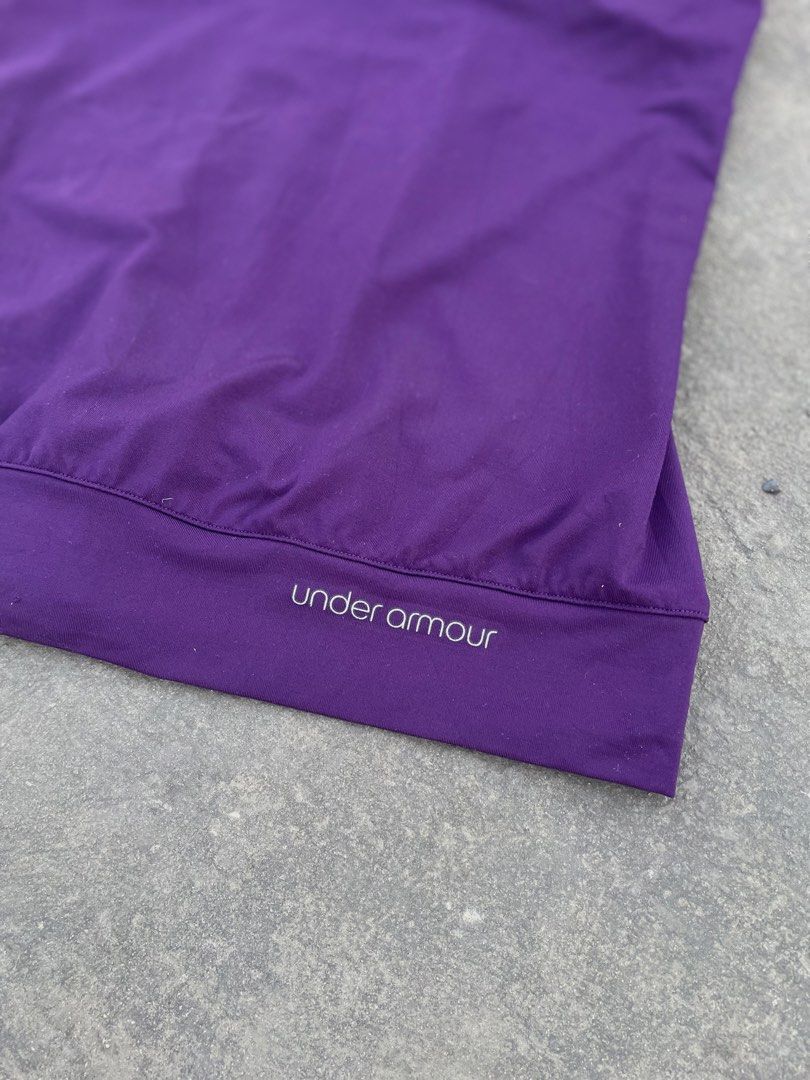 Under Armour Purple Tank Top (Category: Sleeveless) located in Makati City. Submitted by kayecheng (Listing ID 1436538908, Image 2). Description: - Under Armour purple tank top - Racerback design - Dark grey lining - Under Armour logo detail - Made of athletic material - Perfect for workouts and casual wear.