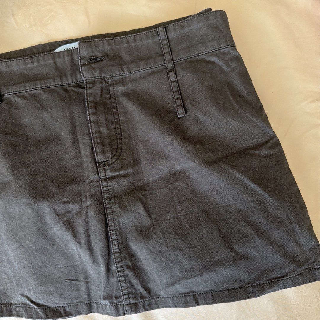 Urban Revivo Mini Skirt (Category: Skirts) located in Taguig. Submitted by charmedandcollected (Listing ID 1436534564, Image 3). Description: - Urban Revivo mini skirt - Neutral color - Size: XS (EUR 34, UK 6) - Classic design - Button and zipper closure - Features belt loops - Simple, clean look - Ideal for casual outfits.