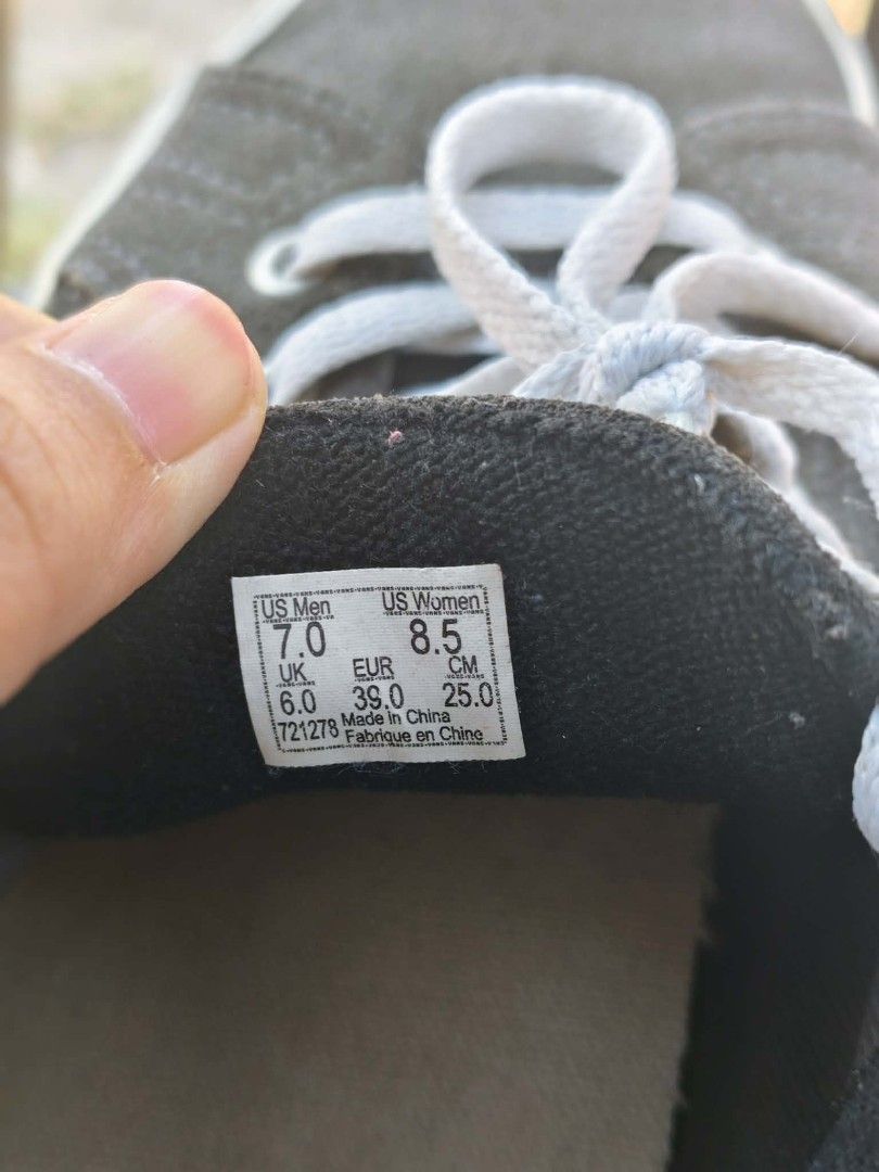 Vans Low Top Sneakers (Category: Sneakers) located in Batangas. Submitted by gojo13 (Listing ID 1436478190, Image 3). Description: - Vans low-top sneakers - Dark grey suede upper - White laces and sole - Vans logo detail - Size: US Men 7 / US Women 8.5 - Made in China.