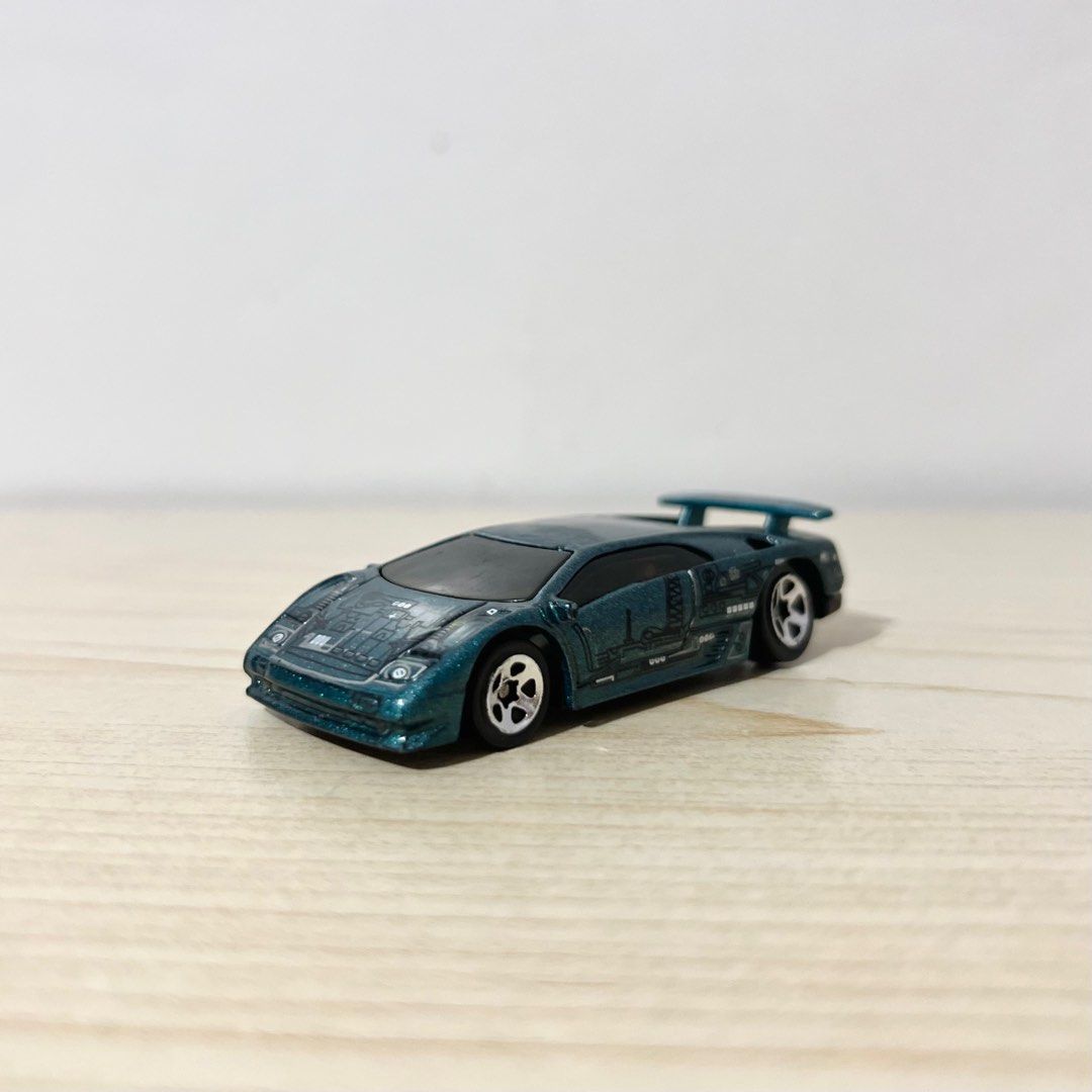 Vintage Hotwheels Lamborghini Diablo - Php 350 NOTE: w/ paint chip (Category: Vehicle & Diecast Models) located in Davao. Submitted by pandorastoybox (Listing ID 1436505861, Image 1). Description: Vintage Hotwheels Lamborghini Diablo - Php 350 NOTE: w/ paint chip.