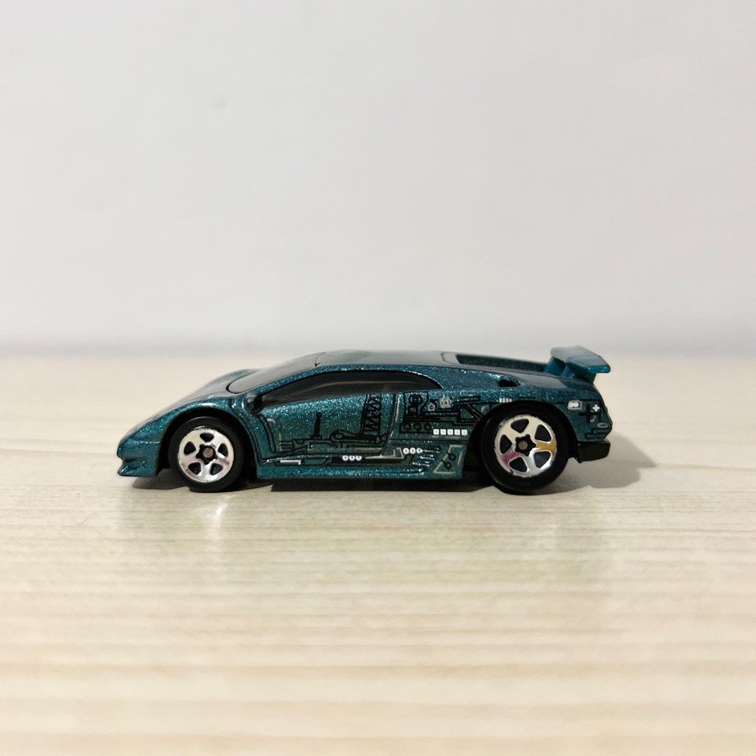 Vintage Hotwheels Lamborghini Diablo - Php 350 NOTE: w/ paint chip (Category: Vehicle & Diecast Models) located in Davao. Submitted by pandorastoybox (Listing ID 1436505861, Image 2). Description: Vintage Hotwheels Lamborghini Diablo - Php 350 NOTE: w/ paint chip.