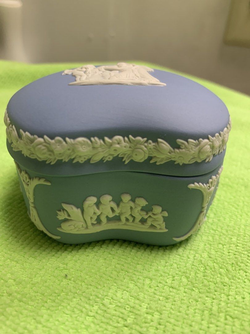 Wedgwood Blue Jasperware Trinket Box (Category: Accessory Holder, Box & Organizers) located in Quezon City. Submitted by kitkatvergz (Listing ID 1436597596, Image 2). Description: - Wedgwood blue Jasperware trinket box - Heart-shaped design - White bas-relief detailing - Floral accents - Marked "Wedgwood Made in England" - Perfect for jewelry or display - Very Good condition .