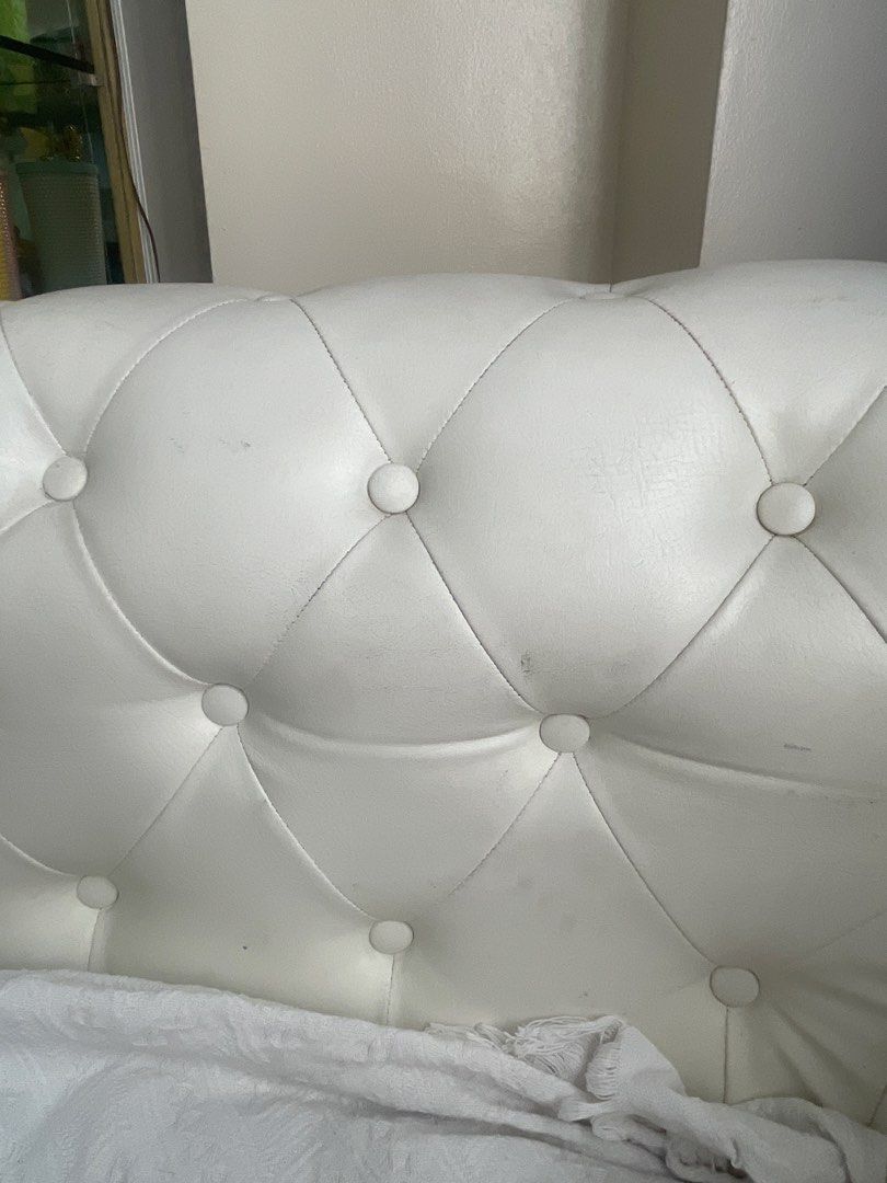 White Leather Sofa (Category: Sofas) located in Rizal. Submitted by annelimited_stuffs (Listing ID 1436521872, Image 3). Description: - White Leather Sofa ✨ Button-tufted design ✨ Elegant and comfortable ⚠️ With visible wear and tear on the cushion Selling at a low price due to condition. 💸 ₱7,000 Message me if interested..