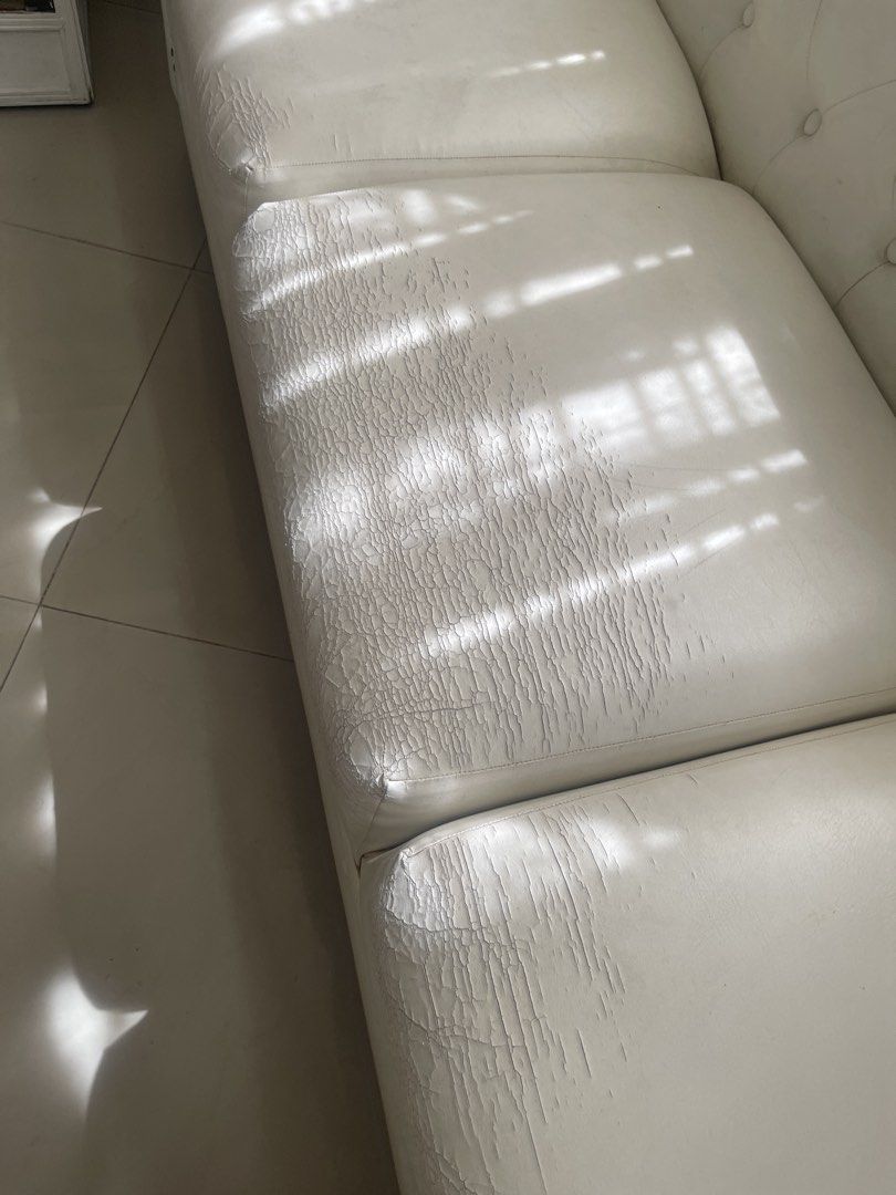 White Leather Sofa (Category: Sofas) located in Rizal. Submitted by annelimited_stuffs (Listing ID 1436521872, Image 1). Description: - White Leather Sofa ✨ Button-tufted design ✨ Elegant and comfortable ⚠️ With visible wear and tear on the cushion Selling at a low price due to condition. 💸 ₱7,000 Message me if interested..