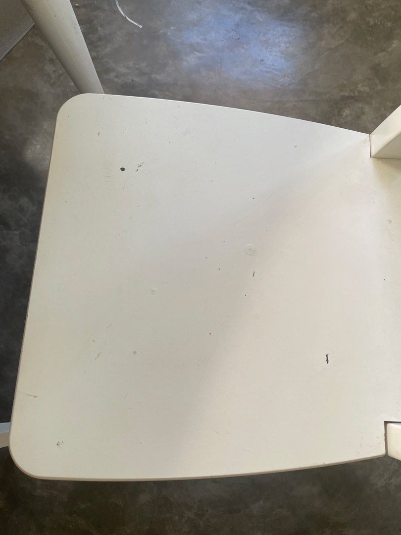 White Wooden Dining Chair (Category: Chairs) located in Santa Rosa. Submitted by emelyn71 (Listing ID 1436472492, Image 2). Description: - White wooden dining chair - Features an X-shaped back design - Square seat - Curved backrest - Minor marks present - Painted white.